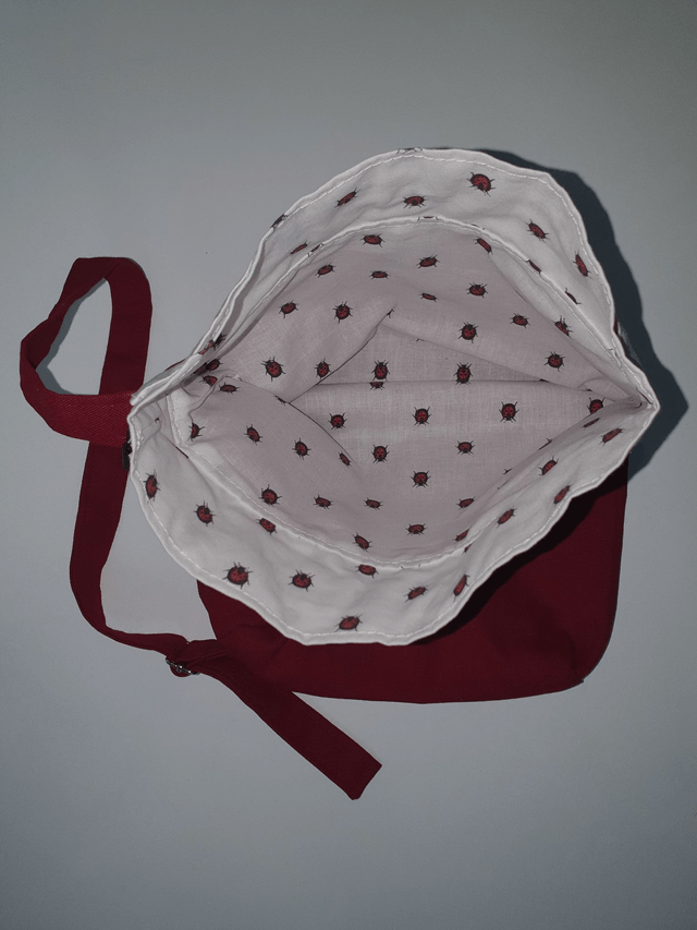 Sac à pain bordeaux et motifs coccinelles