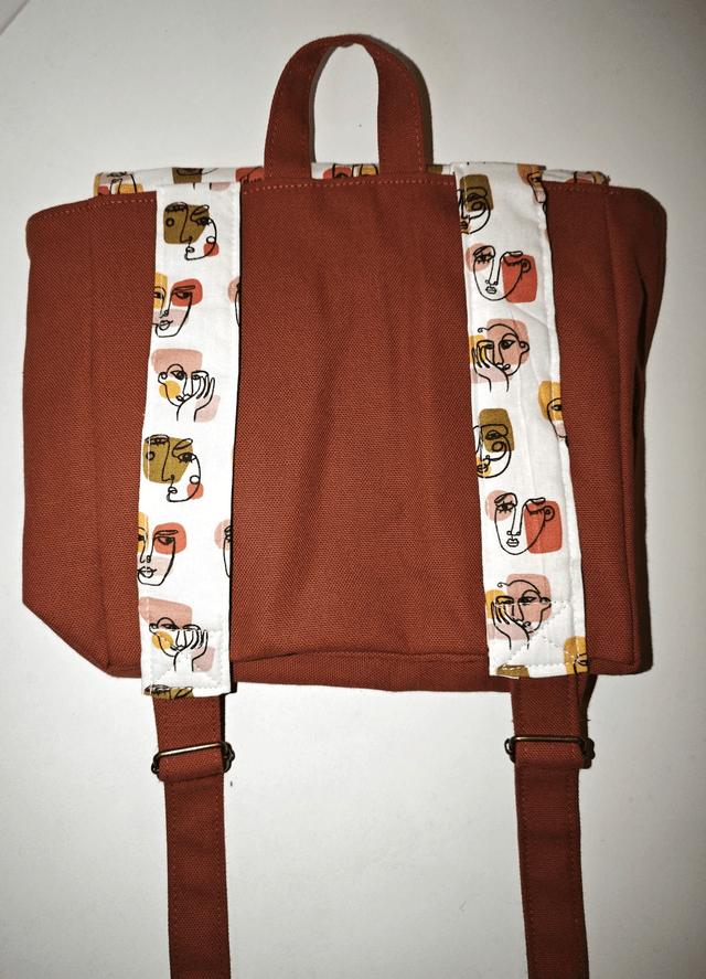 Sac à dos marron motifs Picasso