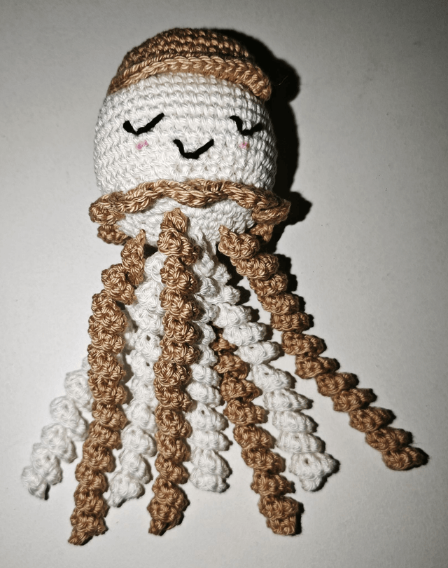 Pieuvre blanche et beige